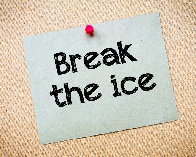 Break the ice Message. Recycled paper note pinned on cork board. Concept Image